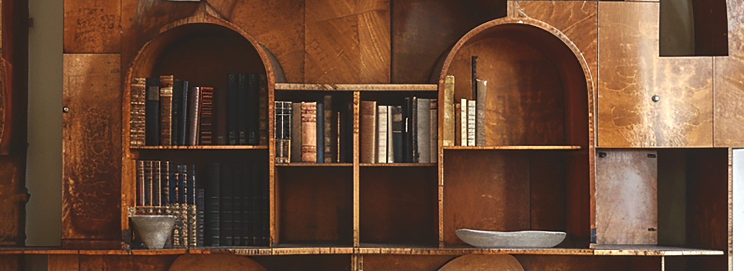 Bookcase in a room, prepared for removal.