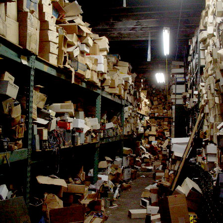 Clearing out a warehouse, sorting through shelves and carrying boxes. Engaged in removing junk and obsolete inventory for disposal and liquidation.